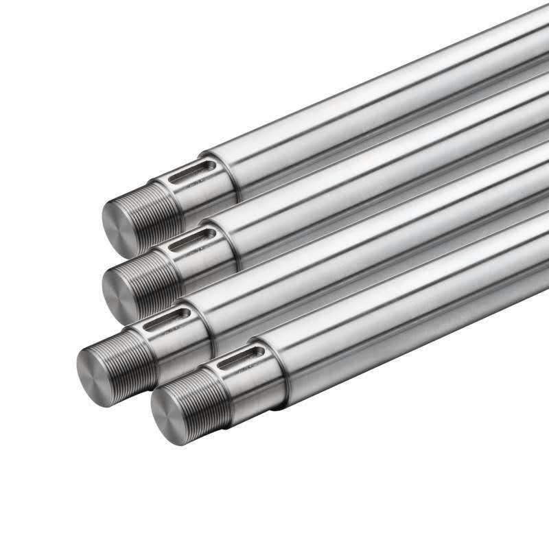 Technician inspecting a hydraulic cylinder piston rod for wear and damage